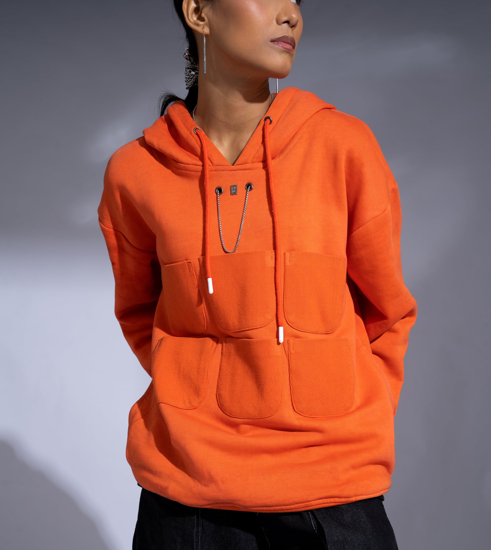 Pocket Hoodie: The model is wearing size S.