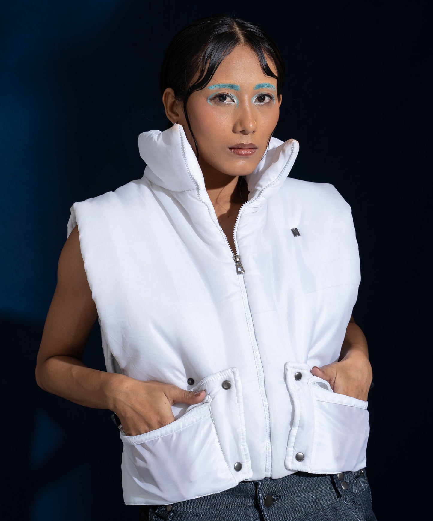Puffer Vest: The model is wearing size M.