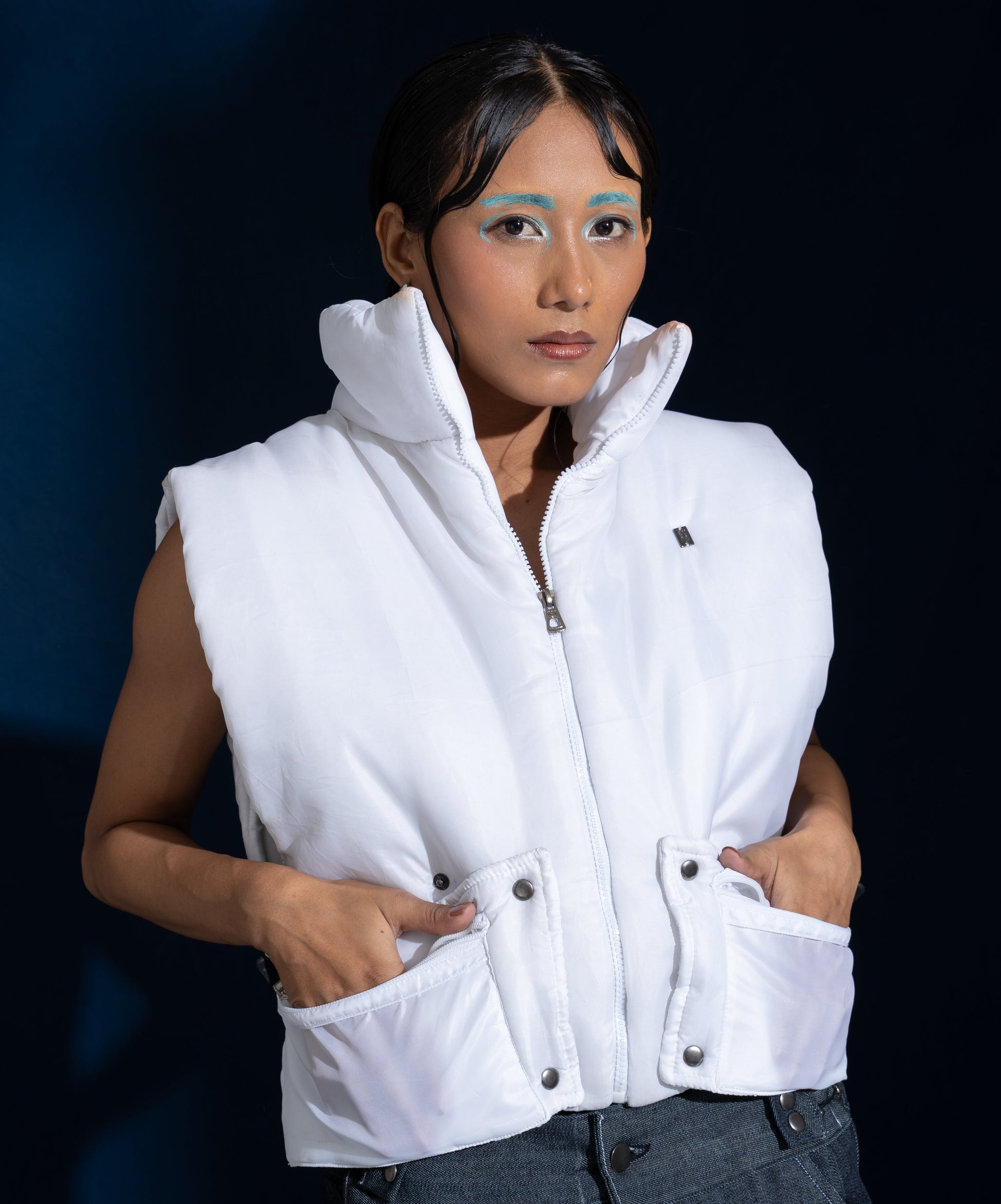 Puffer Vest: The model is wearing size M.