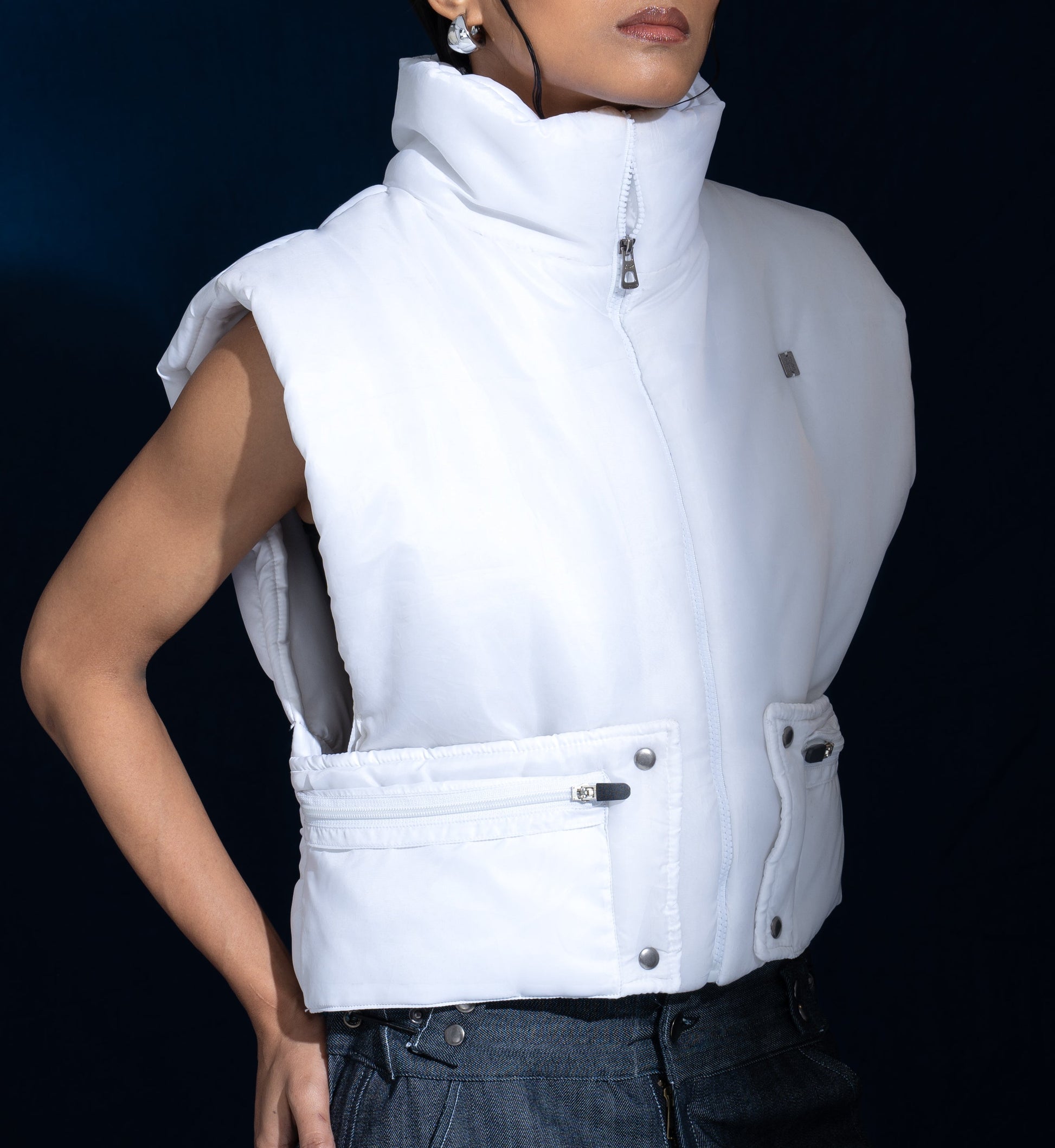 Puffer Vest: The model is wearing size M.