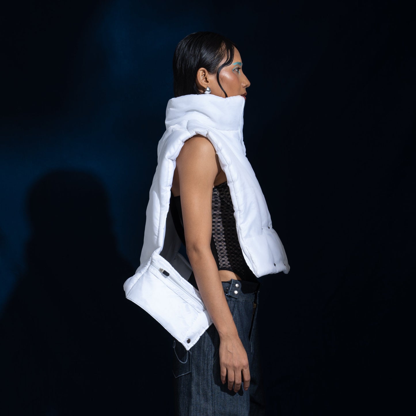 Puffer Vest: The model is wearing size M.