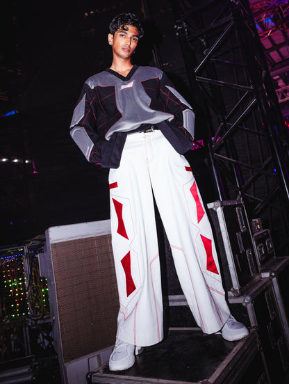 Model backstage a BUDXNBAHOUSE fashion show wearing Silver Black Patchwork T-shirt