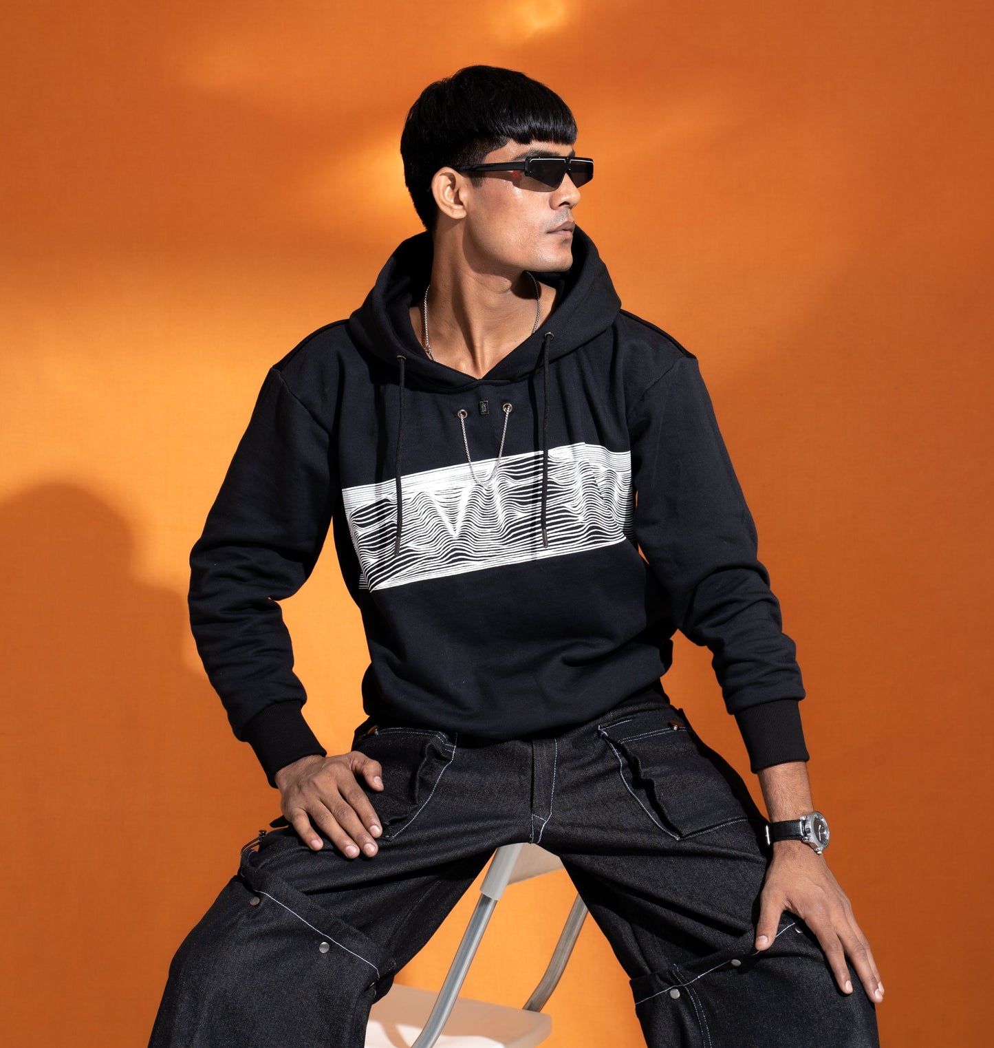 Even Hoodie: The model is wearing size M