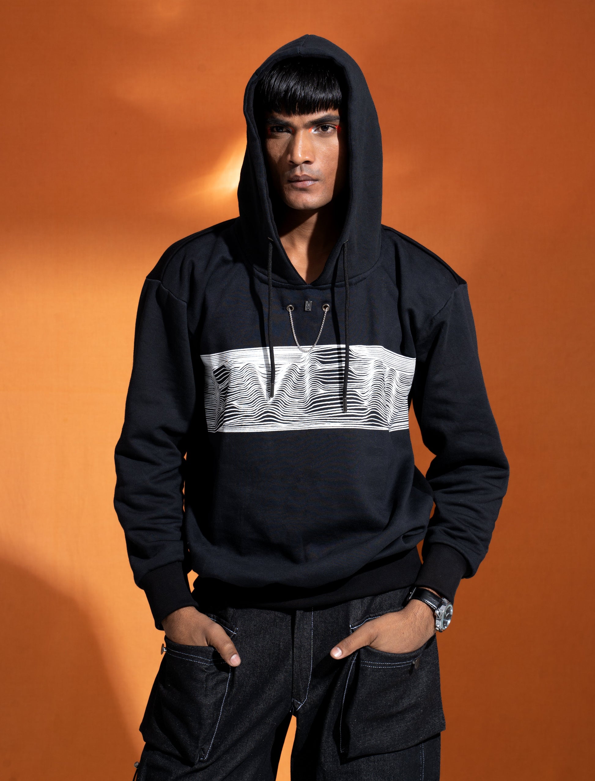 Even Hoodie: The model is wearing size M