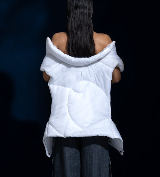 Puffer Vest: The model is wearing size M.